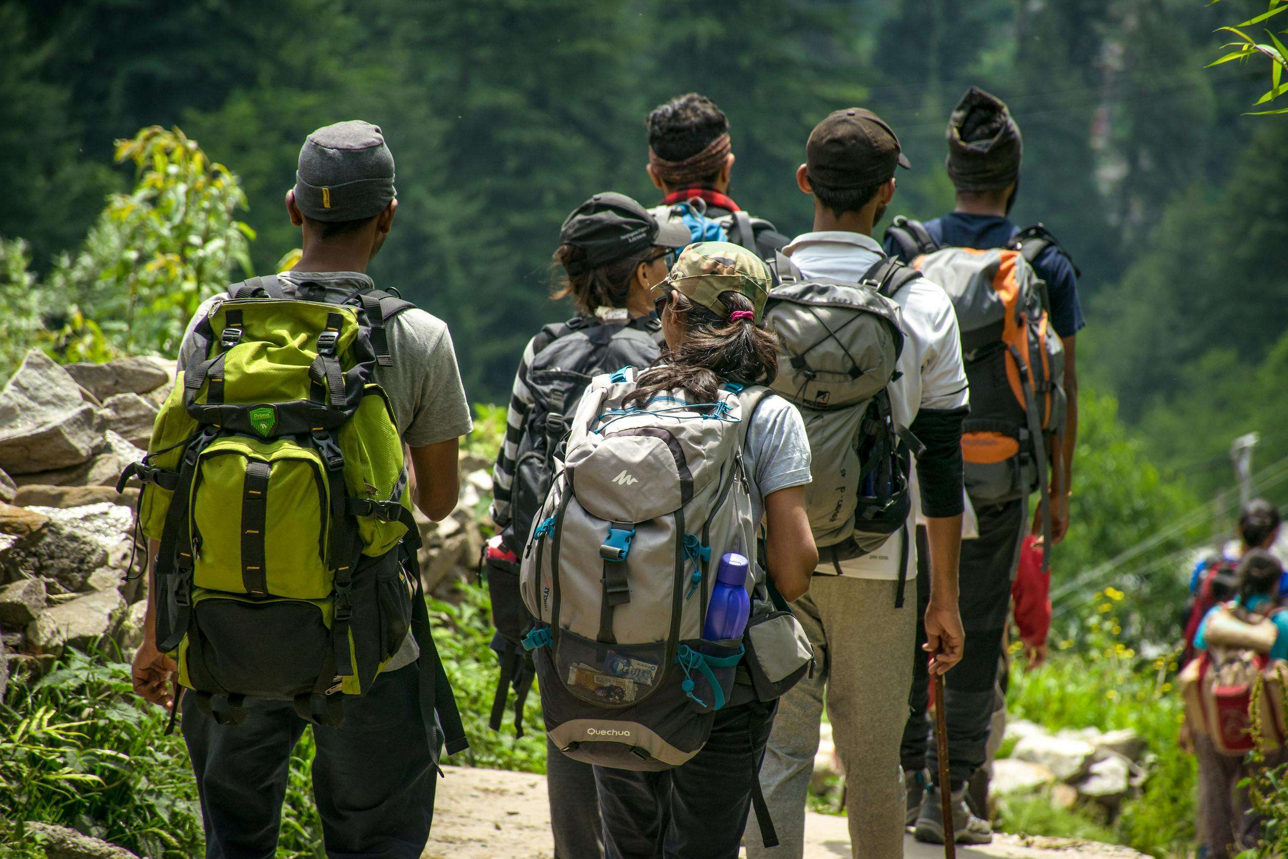People Walking on Road Near Trees at Daytime Photo Self-care is essential in maintaining our health. Here are some self-care strategies to encourage you to step outside and rejuvenate.